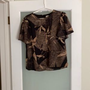 Very nice blouse bought on impulse never worn